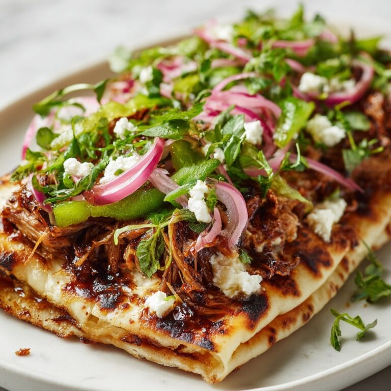 Lamb Gyros with Warm Pita and Fresh Toppings Recipe