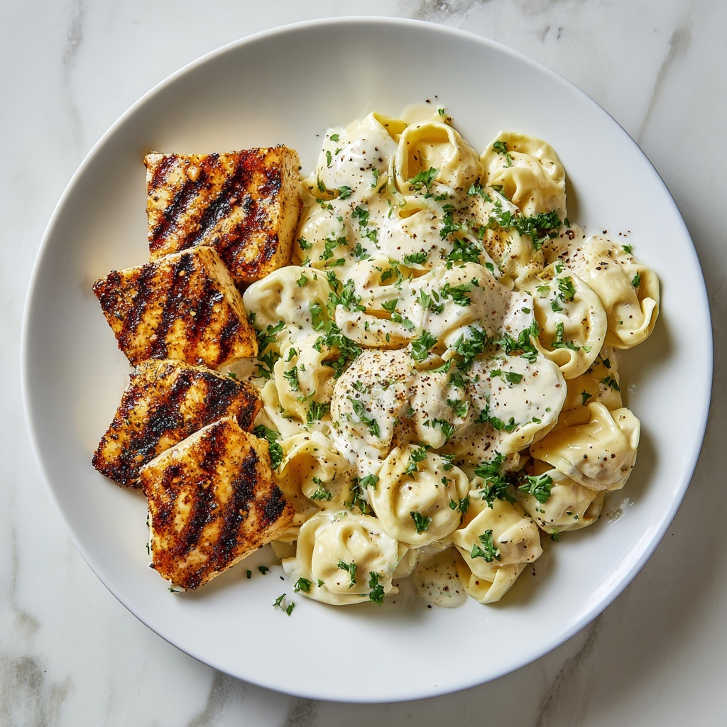 Asiago Tortellini Alfredo with Grilled Chicken Recipe - Recipe Image
